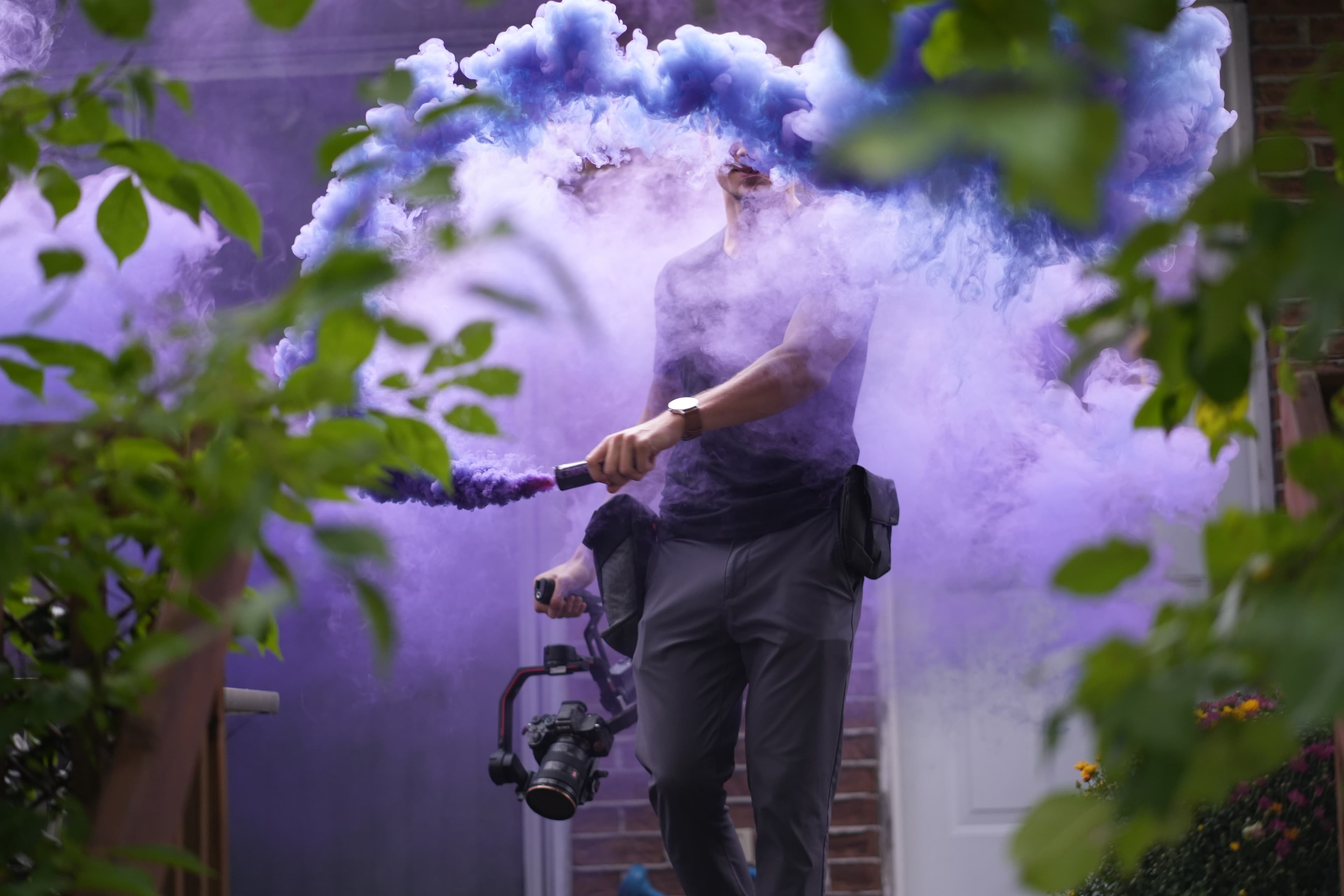 my portrait image with purple smoke and camera
